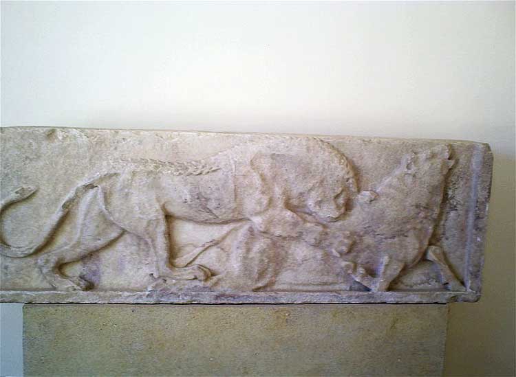 Relief of a lion or a panther devouring a bull.