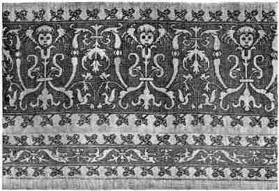 Wide and narrow strip design, edged with floral pattern