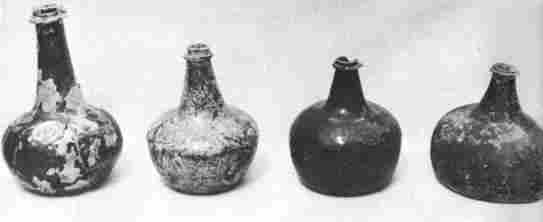 [Illustration: Glass wine bottles unearthed at Jamestown ranging in date from 1640 to 1690. Thousands of fragments of these bottles have been recovered.]