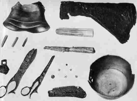 [Illustration: A few objects unearthed at Jamestown which were used for trading with the Indians. Shown are glass beads, scissors, iron knives, a hatchet, and bell fragments.]