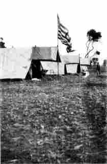 [Photograph: A Flag Flew Over the Colonel's Tent]