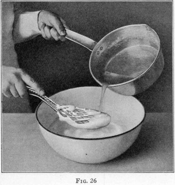 [Illustration: FIG. 26, Pouring hot sirup over beaten egg whites.]