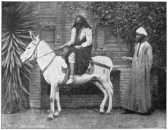 Egyptische vrouw op een ezel.