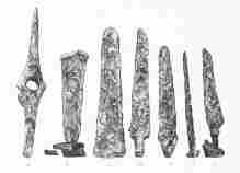 No. 45. Copper Implements and Weapons from the Trojan stratum (8 M.). a, Axe of an unusual form; b, c, Battle-Axes of the common form; d, e, g, Knives; f, a Nail.