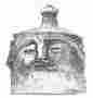 No. 74. Vase Cover with a human face. From the Trojan Stratum (8 M.).