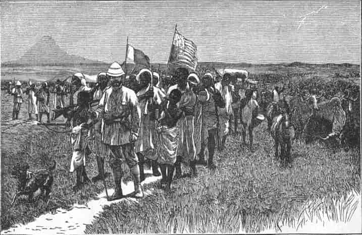 STANLEY AND HIS MEN MARCHING THROUGH UNYORO