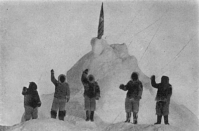 MEMBERS OF THE PARTY CHEERING THE STARS AND STRIPES AT THE POLE, APRIL 7, 1909