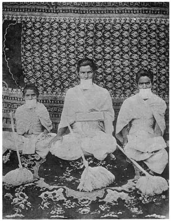 Jain ascetics with cloth before mouth and sweeping-brush