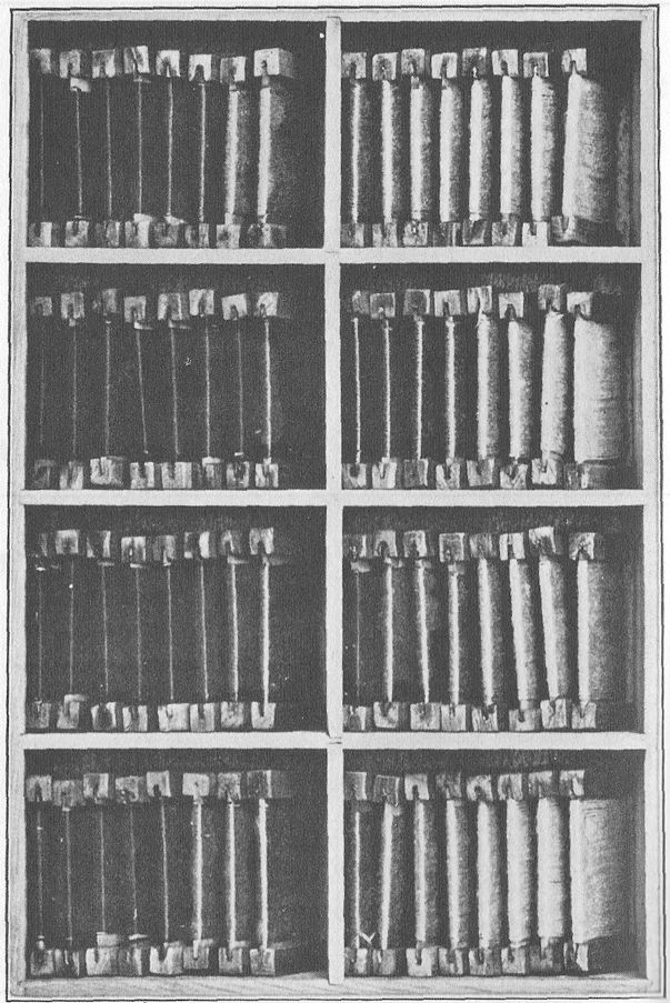 TABLETS WOUND WITH COLOURED SILK. Used for educating the chromatic sense. The tablets are shown in the boxes in which they are kept.