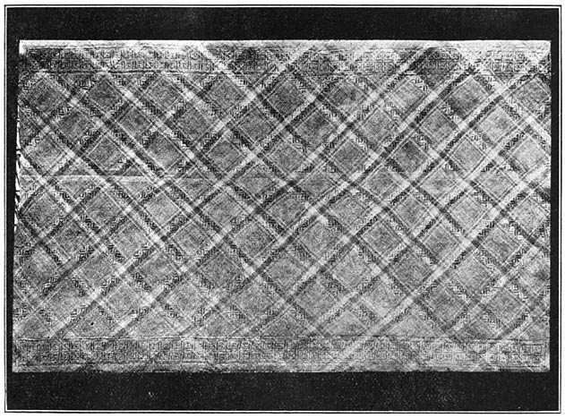 Plate XIII, fig. 1. Mat with woven-in border showing confusion in design.