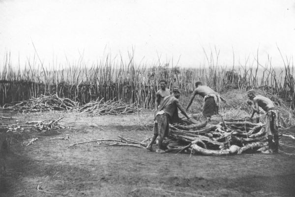 PRIESTS BUILDING THE SACRED FIRE