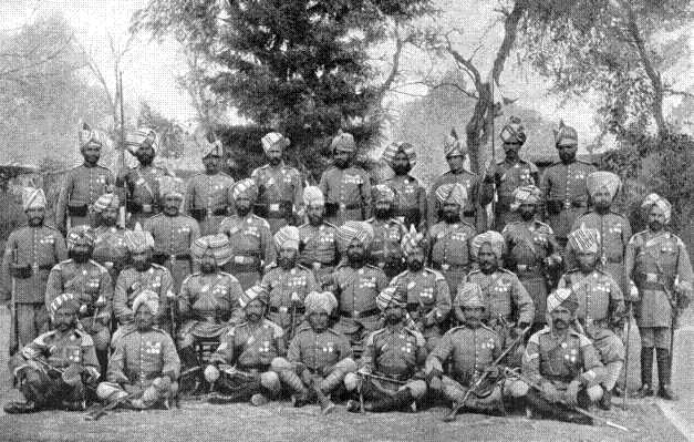 Thirty-four wearers of the Star "For Valour," all serving at one time in the Corps of Guides. This is the highest distinction open to an Indian soldier for gallantry in action. The group illustrates the variety of tribes enlisted in the Guides-Afridis, Yusafzai Pathans, Khuttuks, Sikhs, Punjabi Mahomedans, Punjabi Hindus, Farsiwans (Persians), Dogras, Gurkhas, Kabulis, Turcomans, &c., &c., most of whom are here represented