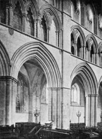 SOUTH NAVE ARCADE, SHOWING THE JUNCTION OF THIRTEENTH AND FOURTEENTH-CENTURY WORK.