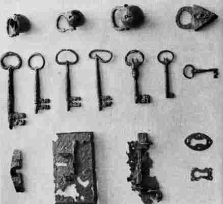 [Illustration: The majority of the locks and keys used in the early houses were imported from England.]